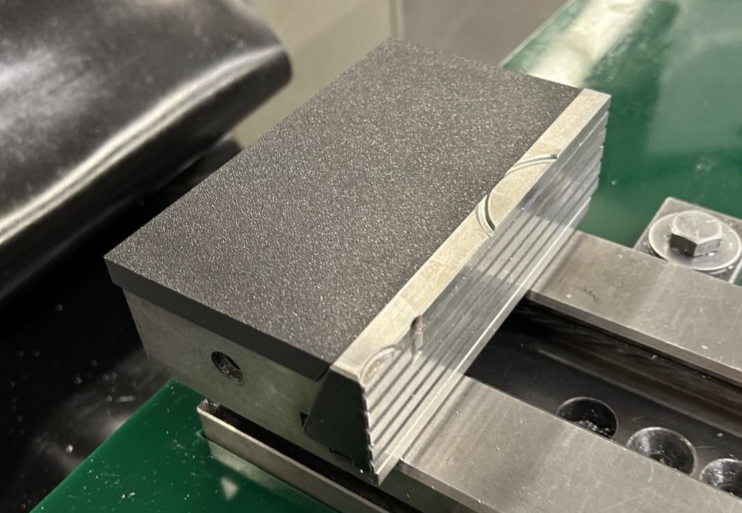 The 3D printed vise cover.